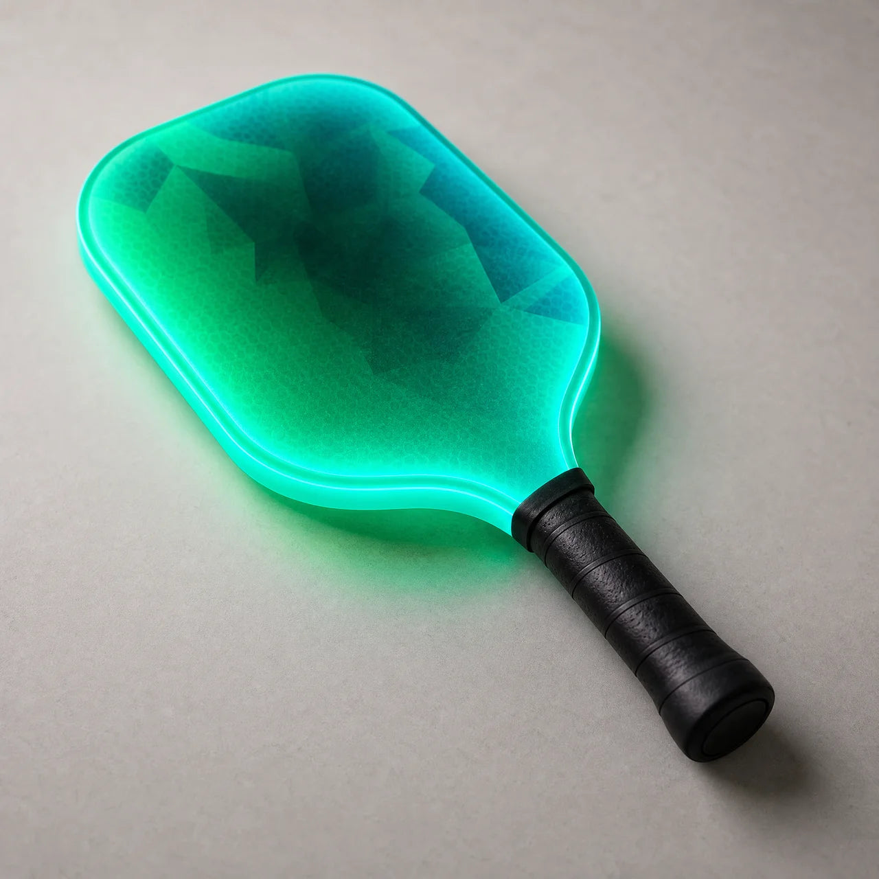 Close-up of the glowing paddle edge and playing face